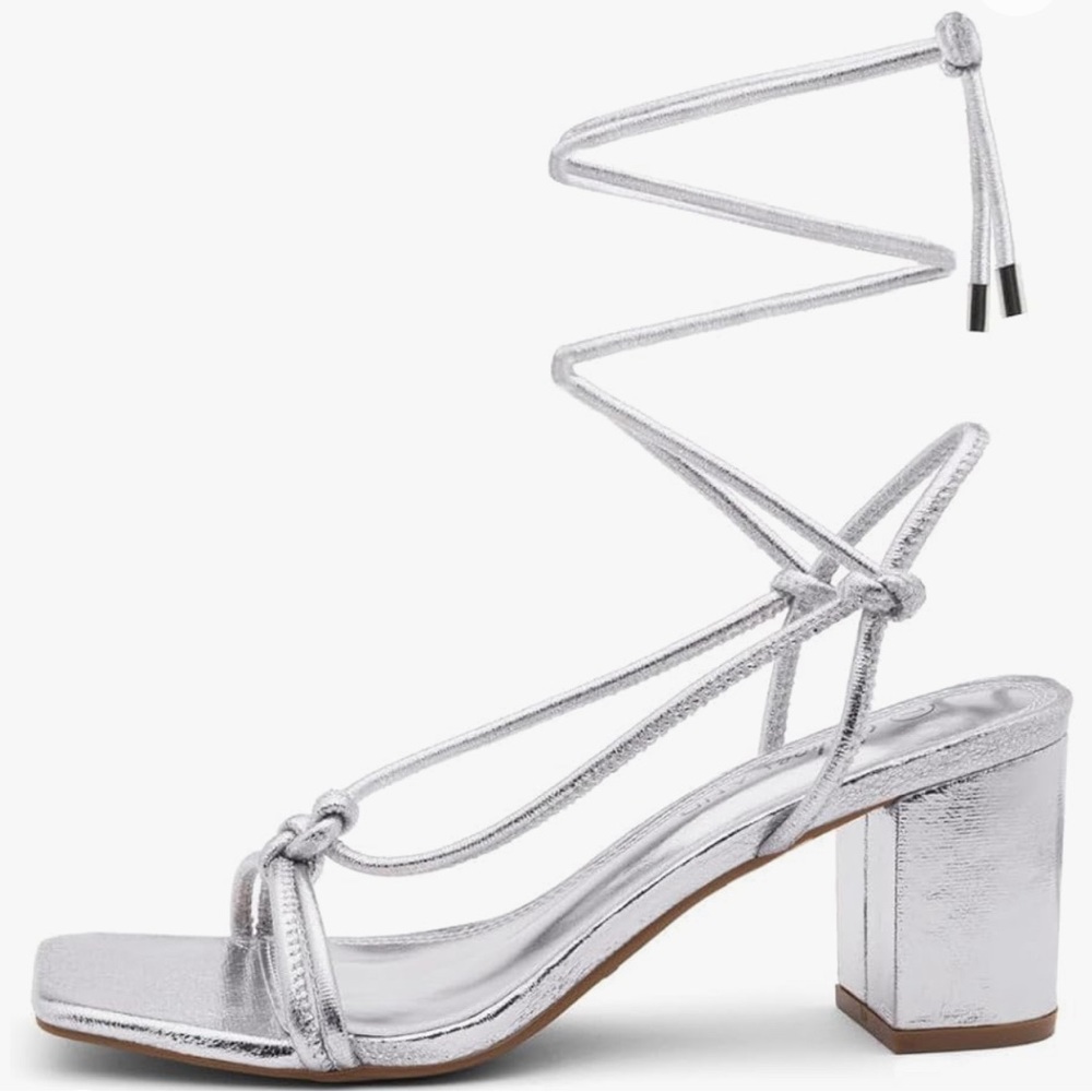 Worn once! Silver heels to help your outfit pop!